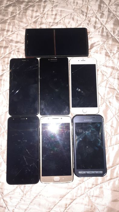 Телефони за части