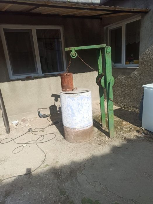 Vand dispozitiv/ rola cu lant de scos apa din fantana manual.