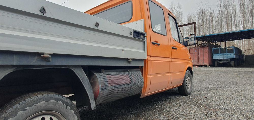 daimlerchysler yuk-yulovchi tashuvchi bortli