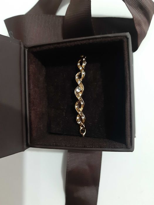 Bratara placata cu aur cu strasuri in cutie TEILOR cu fundita