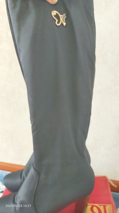 Женские сапоги..