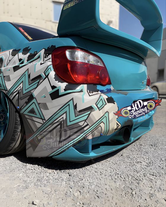 Бампер задний со сплиттером Subaru Impreza GDB