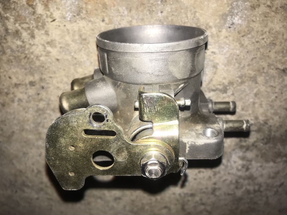 Дроссельная заслонка Новая для Волги газ