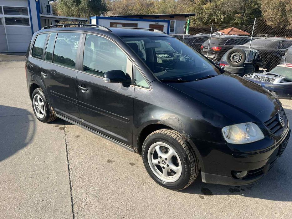 Vw Tuaran 1.9 105кс.код на мотора BKC 2006 г