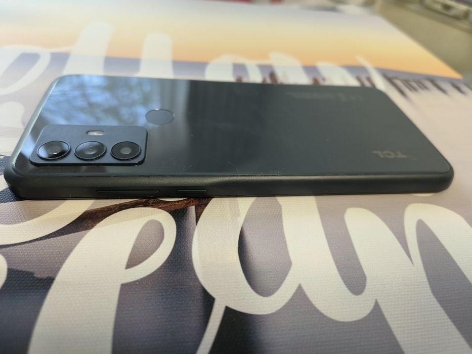 Telefon tcl 306 impecabil