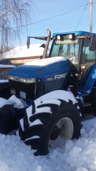 Трактор  new holland 8670