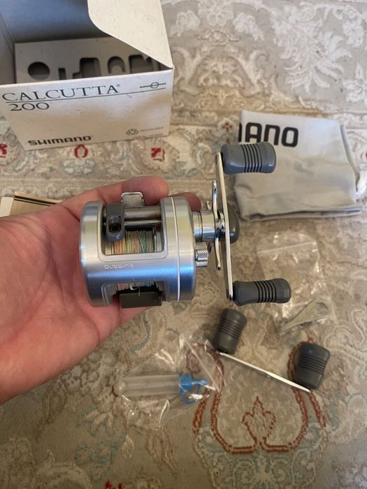 Shimano calcutta 200 топовая катушка