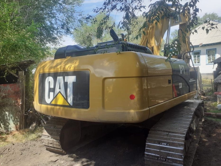 Экскаватор с гидромолотом. Гидромолот CAT B30