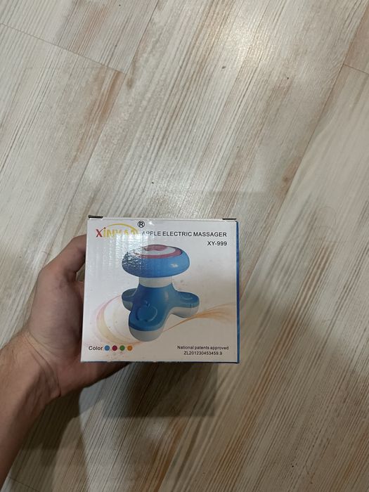 масажер электрический