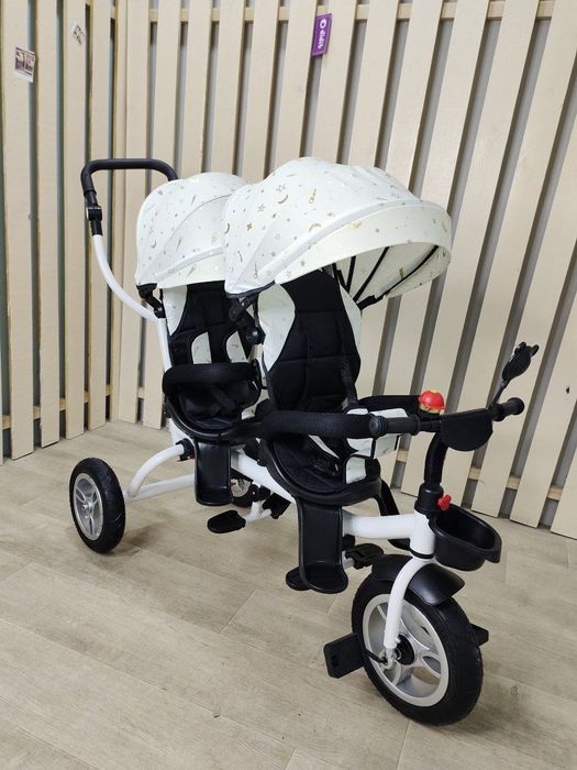 Двойняшки велоколяска