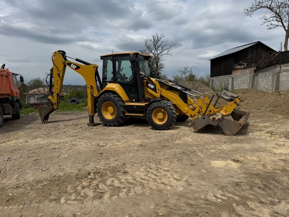 Buldoexcavator Caterpillar!!