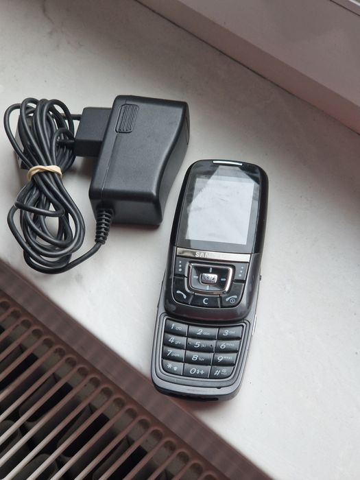 Telefon slide D600E cu incarcator original