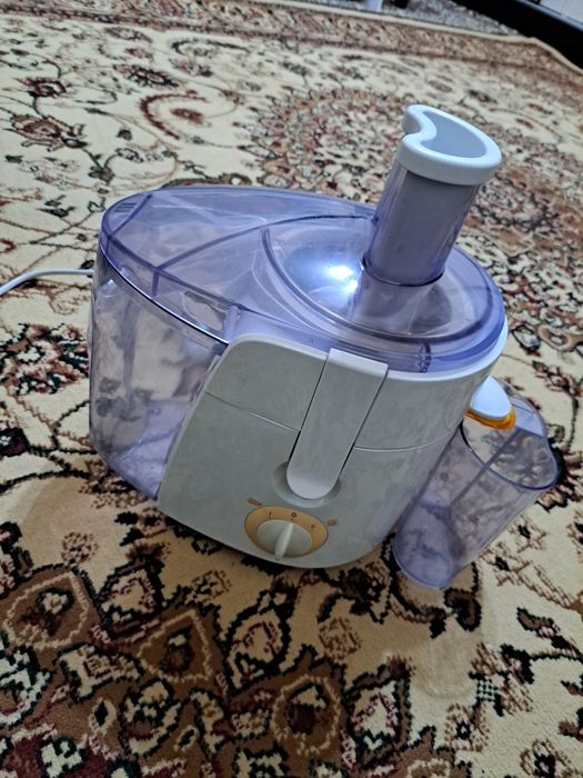 Соковыжималка от бренда philips