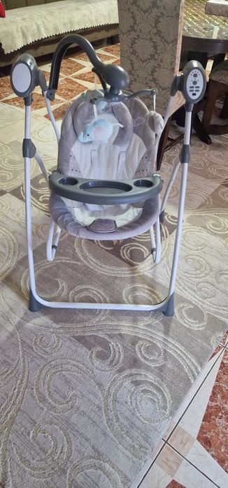 Leagăn bebeluși electric