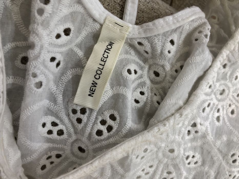 Bluză elegantă cu broderie florală și spate decupat, mărimea 34