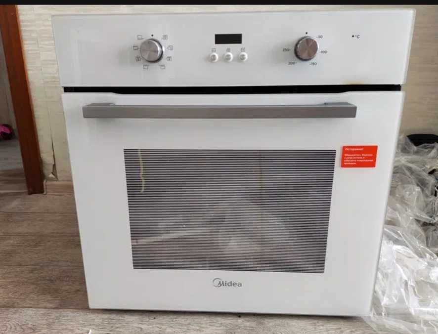 Продам встраиваемая духовка Midea MO 47000 GW (Б/У)