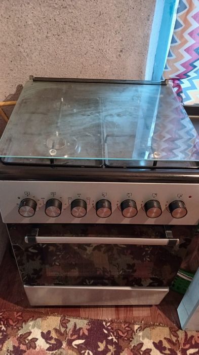 Продам электрическую газ плиту