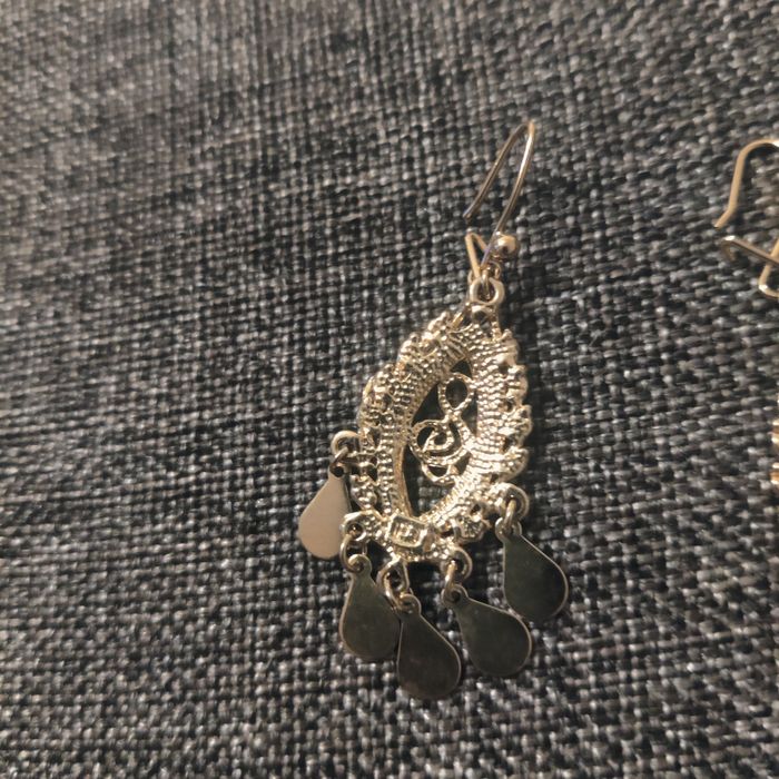 Лого на нота със камъчета