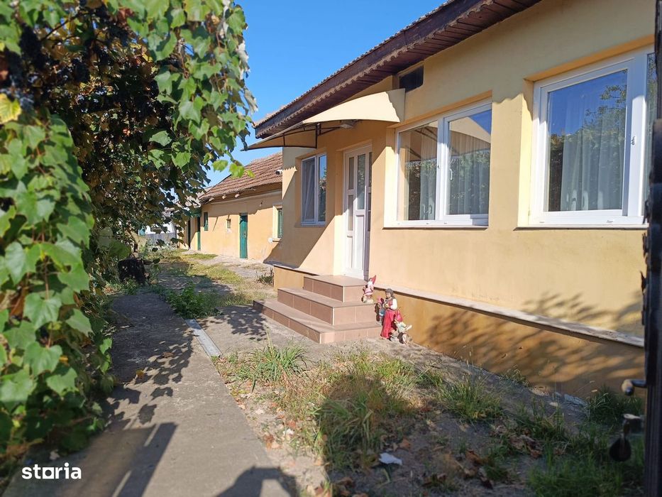 Casa + teren Pielesti deschidere 18m,1100mp,toate utilitatile
