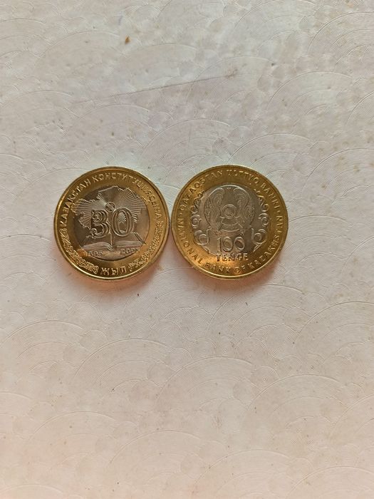 Продам монету 100 ТГ 30 лет