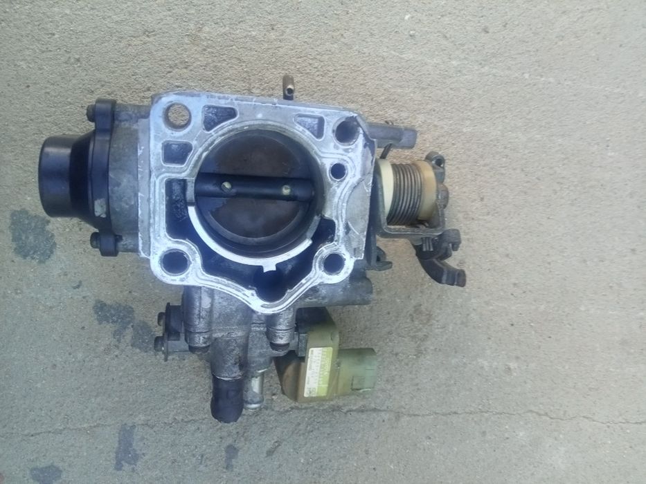 Продам дроссельный заслонка