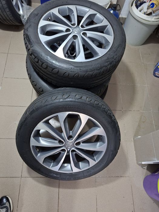 Vand 4 roti de NISSAN QASHQAI J11,J10 cu cauciucuri de vara 215/55/R18