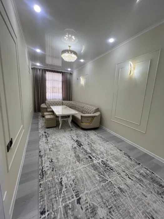 Янги кизил гиштли  домдан 2 хонали евротамирланган квартира сотилади