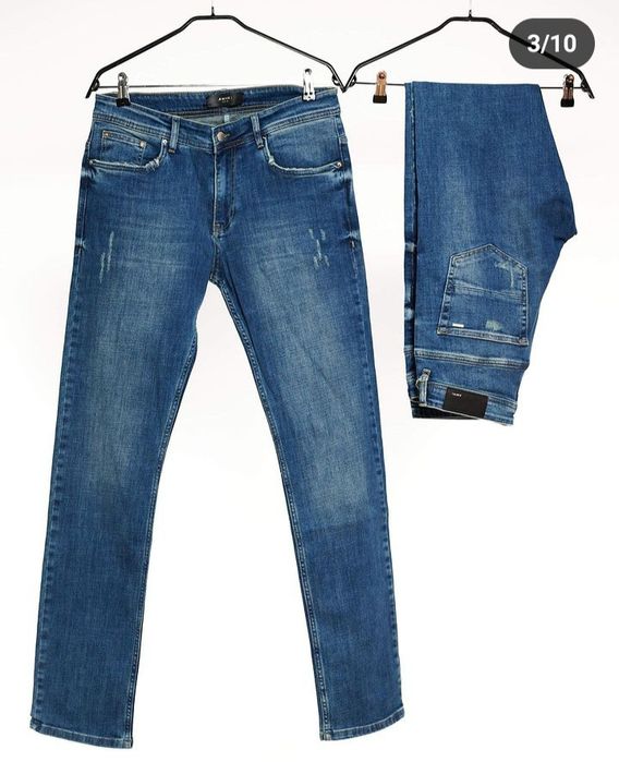 Blugi Guess și Trussardi