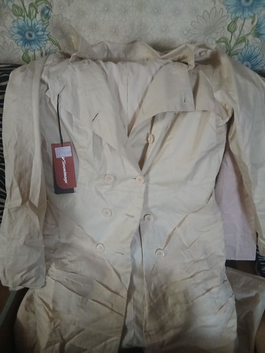 Продам плащи новые с этикетками