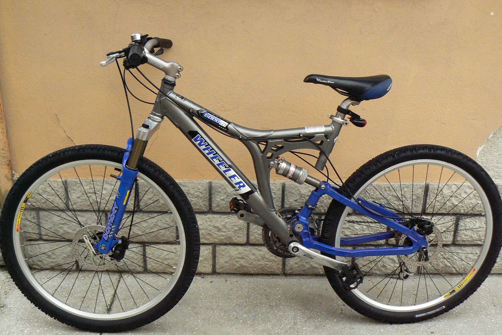 Bicicleta mountain bike de copii full suspensie Wheeler 26
