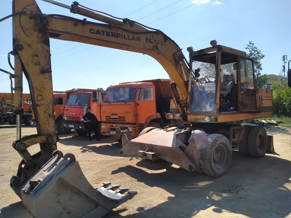 услуги колёсного эксковатора
