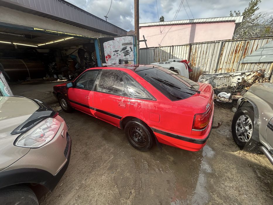 Машина Mazda 626