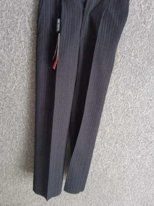 Продам новые брюки и шорты