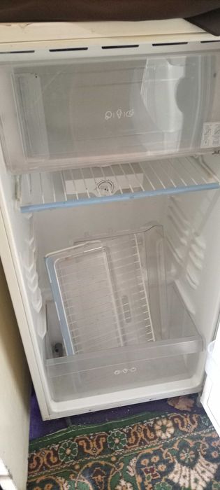 Холодильник не большой