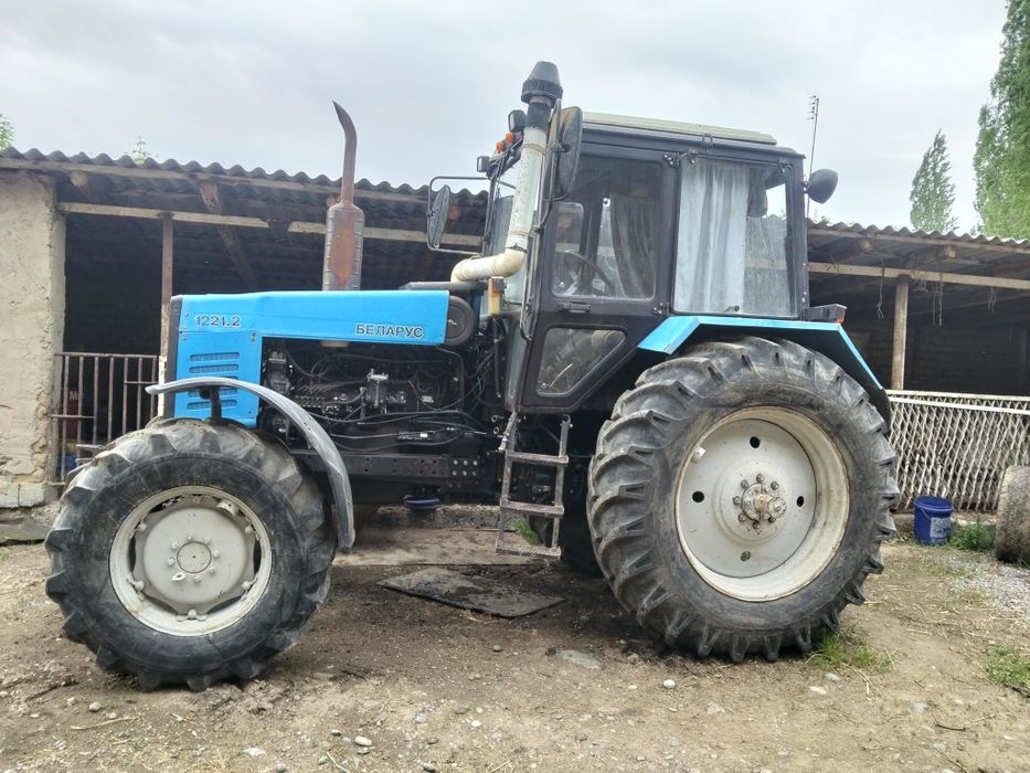 Трактор 1221 и соха 5 корпусны