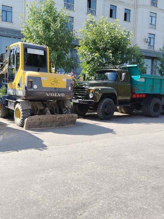 Экскаватор ва зил хизматлари
