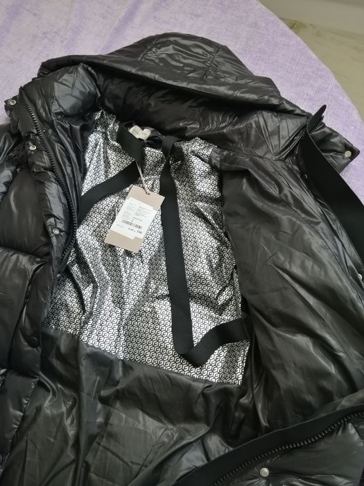 Продам новый пуховик ( Kimex)