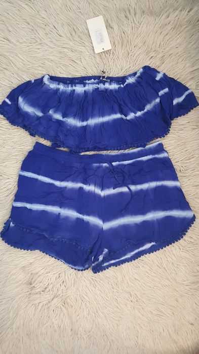 Salopeta cu pantaloni scurți