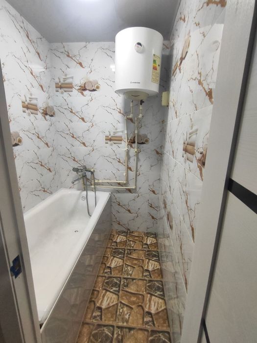 Фаргона Шахар А.Кодирий ку́часи 94-домда 1-этаж, 2 хона янгиплан,