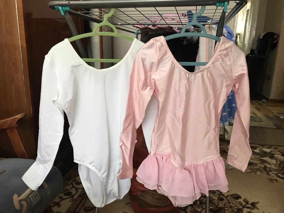 Продам гимнастические костюмы