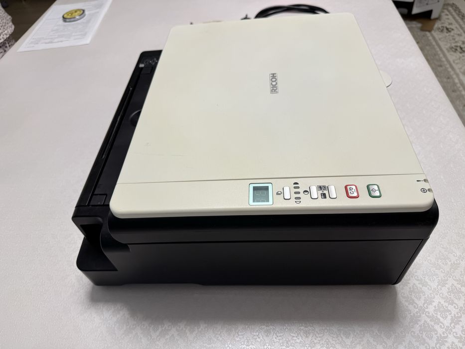 Принтер МФУ Ricoh Aficio SP 100su