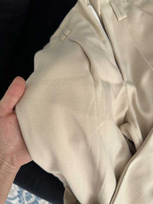 Теплые бежевые брюки