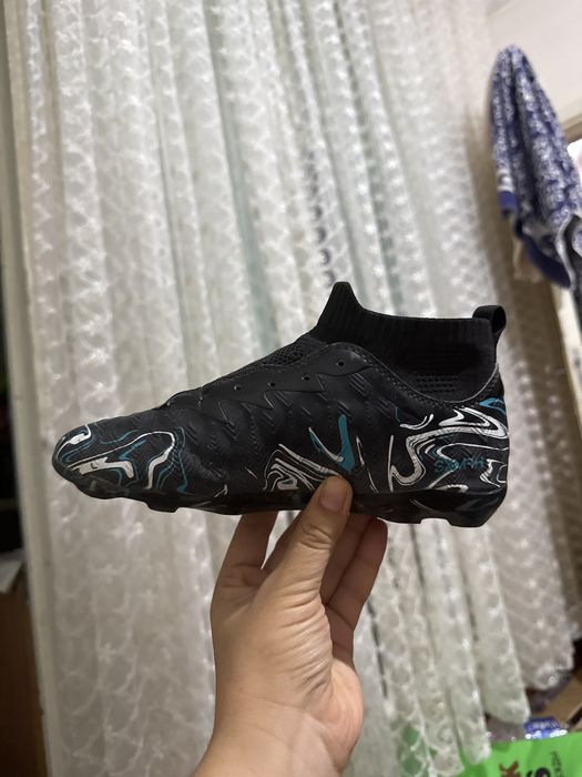Fudbol oyoq kiyimi  35 razmer 34 gaxam keladi sifati zur xitoy idial x