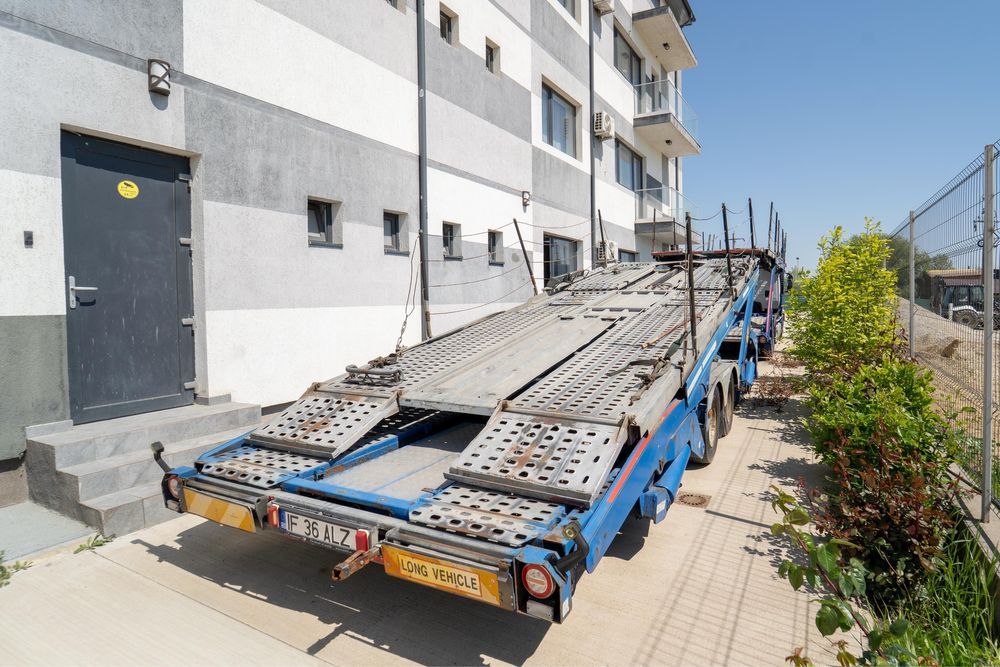 Transportor IVECO + platforma Fasano