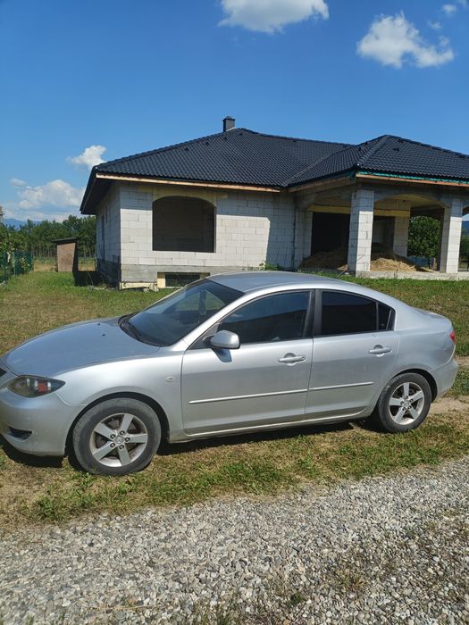 Mazda 3 motorizare 1.6 cm3 an 2004