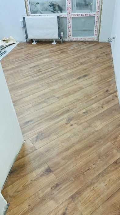 Укладка, установка ламината и паркета