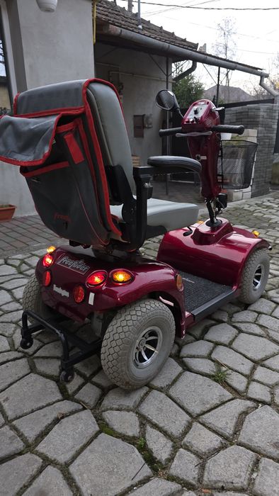 Cărucior (scuter) electric