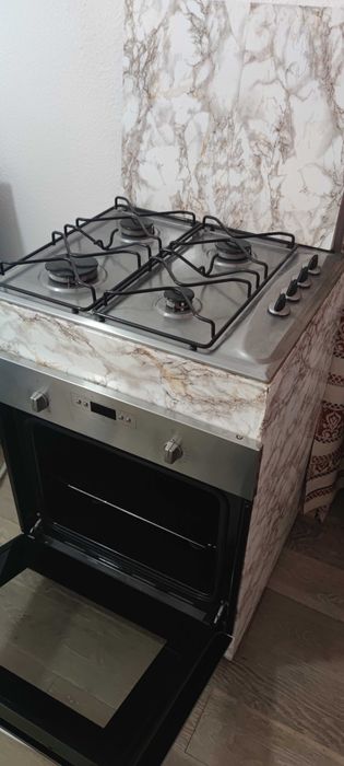 Aragaz cu cuptor electric Whirlpool