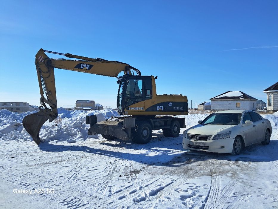 ЭКСКАВАТОР . Услуги колесного экскаватора