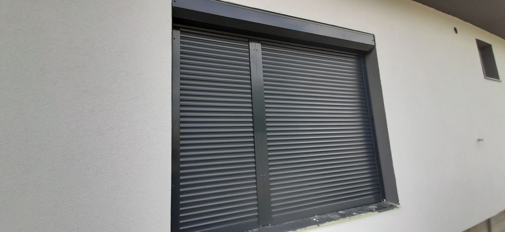 RULOURI Aluminiu si Usi de garaj rezidentiale SECTIONALE